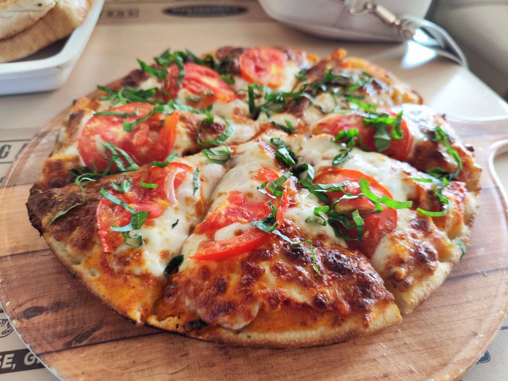 Wood-fired margherita pizza